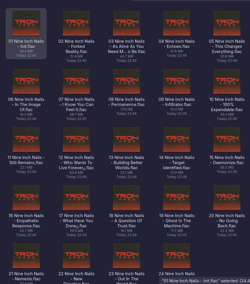 Screenshot. File explorer grid view showing all titles of the new TRON Ares Soundtrack by Nine Inch Nails as .flac files. File sizes range from 18 to 64mb