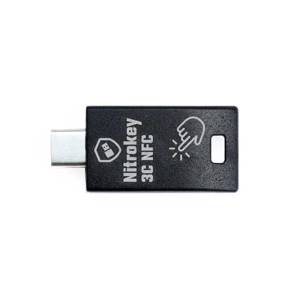 A Nitrokey 3C NFC. Small, black fob made of plastic, with  a small hole at one end to attach a keyring to. The other end of the rectangular fob is a protruding USB-C connector. The plastic says "Nitrokey 3C NFC" on it, has the Nitrokey logo on it and a pictograph of a finger, symbolizing touch functionality.